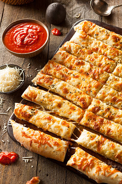 istock Homemade Cheesy Breadsticks with Marinara 470698136