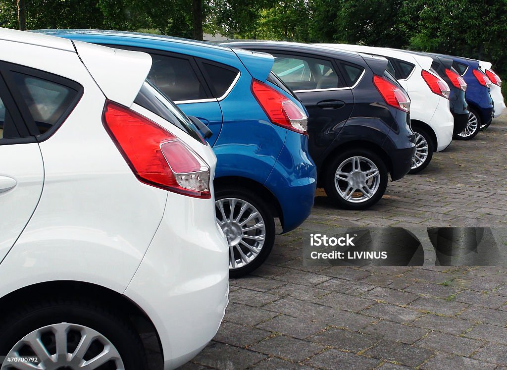 Looking at brand new cars Car Stock Photo