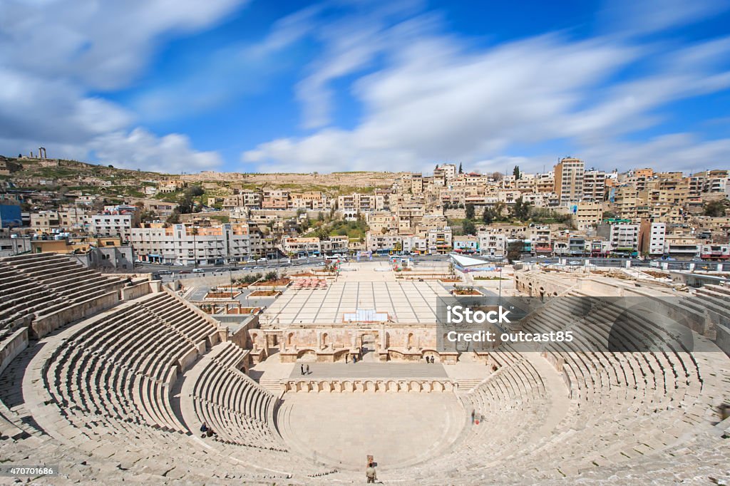 Tourists in the Roman amphitheatre of Amman, Jordan Amman Stock Photo