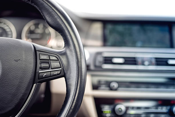 istock Steering wheel of modern car, buttons and adjustment controls 470706288