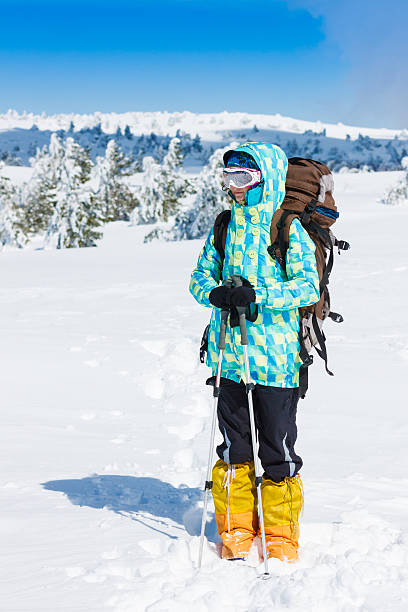 istock Hiker walking in winter mountains 470706497