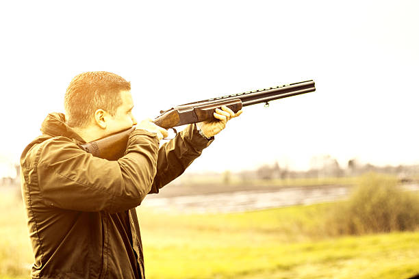 istock View of man doing clay pigeon shooting 470706648