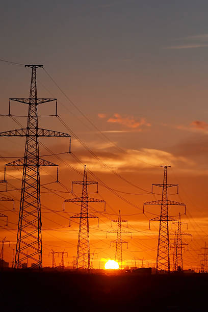istock Electric power transmission lines at sunset. 470711698
