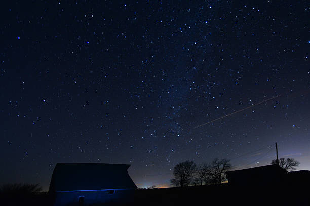istock Astrophography of farm at sunset 470713553