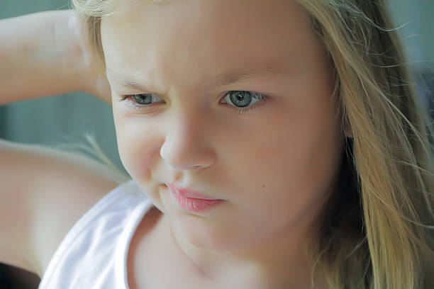 istock Thinking girl with blue eyes 470715111