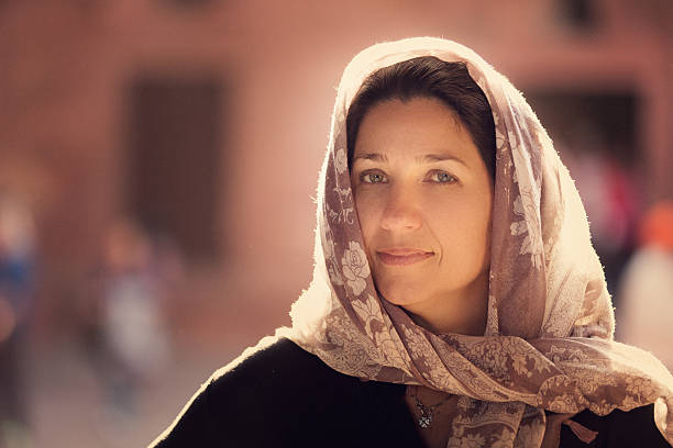 istock Woman portrait with head scarf 470718902