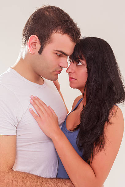 istock Loving young couple looking into each others eyes 470719887
