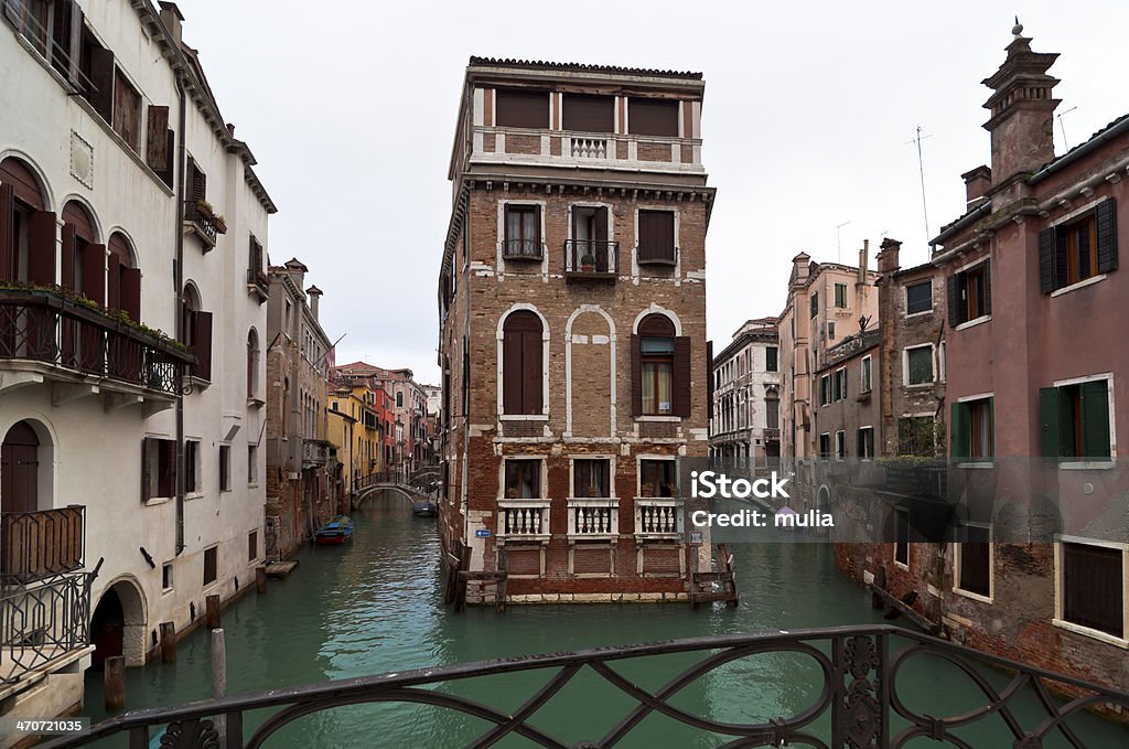 Venice canals and houses in winter day Venice Castello block of houses and canals view from Ponte Dei Conzafelzi in winter day Bridge - Built Structure Stock Photo