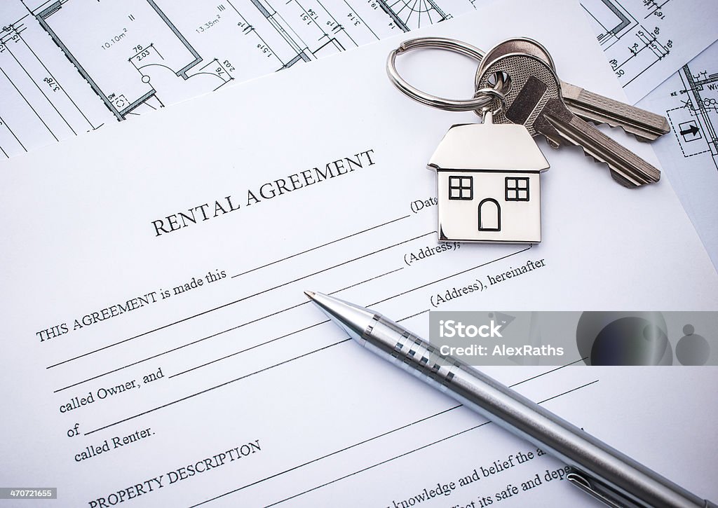 Lease agreement Rental agreement document with keys and pencil Application Form Stock Photo