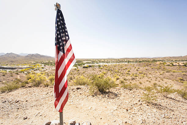 istock American Flag Resting in The Desert 470721804