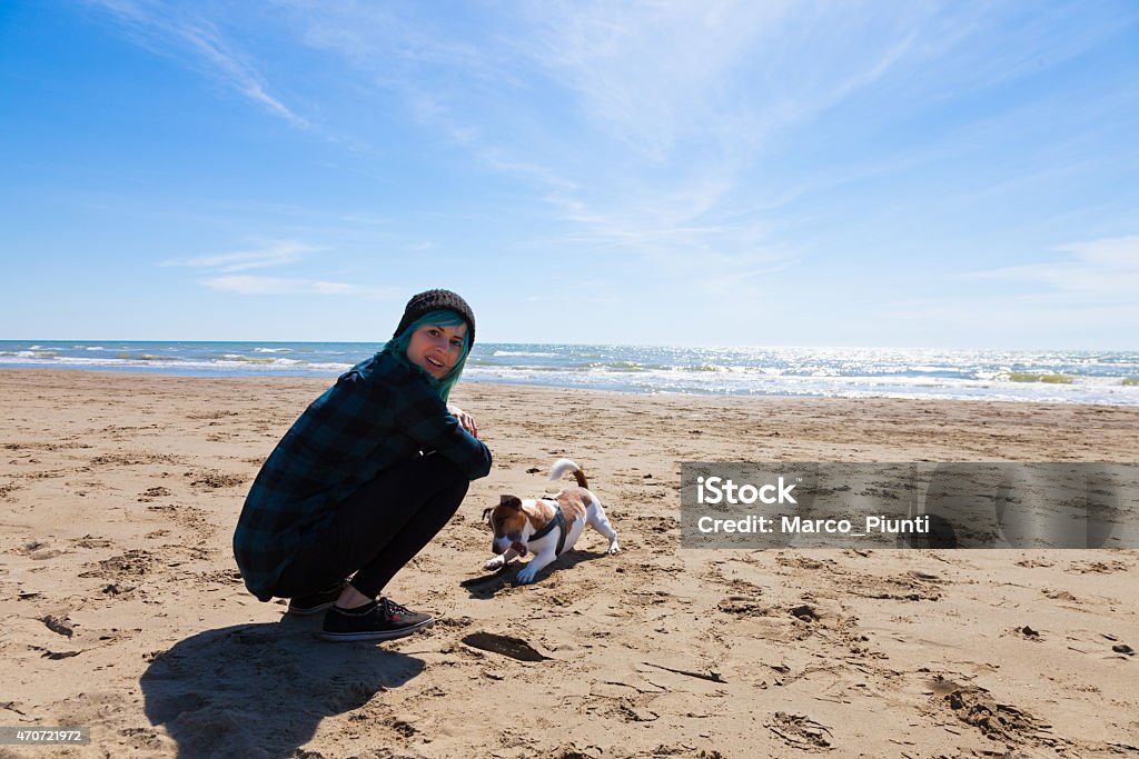 Girl at sea with dog 2015 Stock Photo