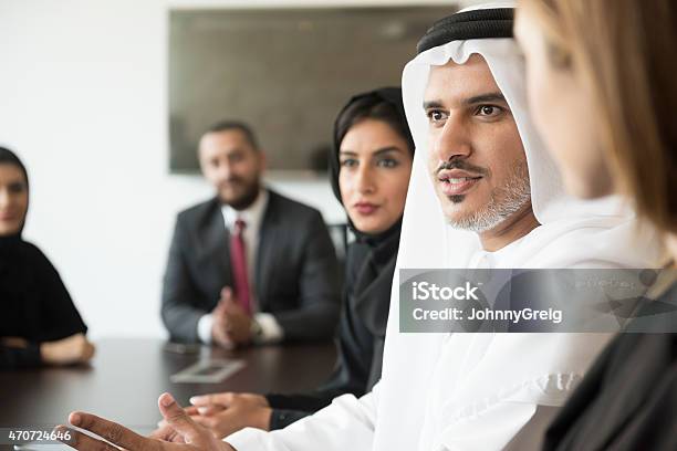 Arab Businessman Talking In A Meeting Stock Photo - Download Image Now - Arabia, United Arab Emirates, Middle Eastern Ethnicity