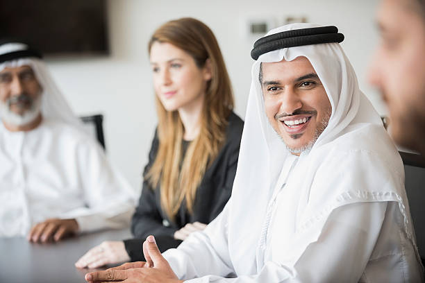 istock Happy Arab businessman with colleagues in office 470724682