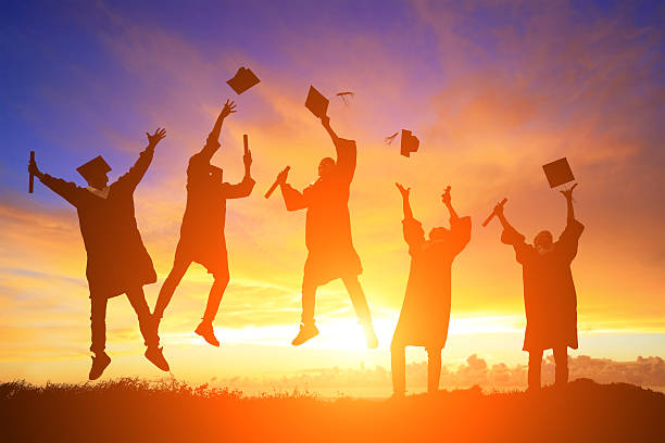 istock happy college graduate student jump 470725442