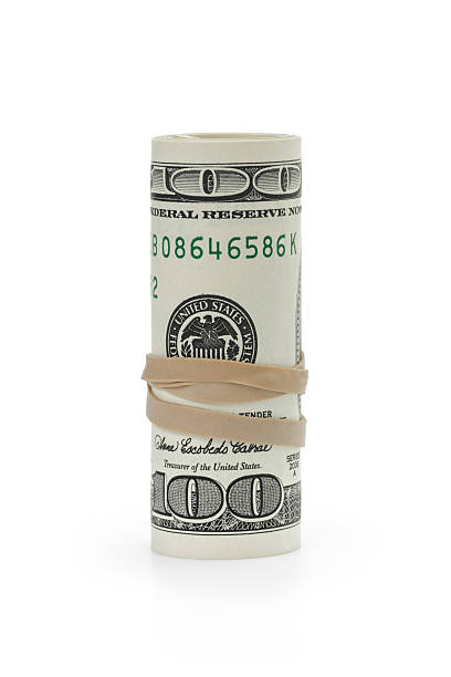 istock rolled hundred dollar banknotes tied with rubberband 470728510