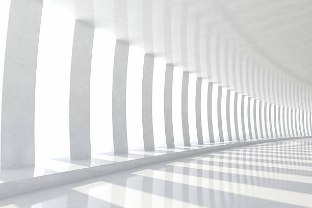 istock Row of white columns with sunlight in empty corridor space 470731170