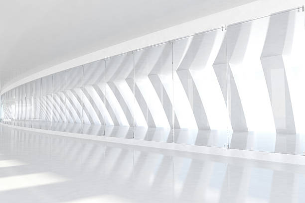 Row of white arches with sunlight illuminating futuristic corridor space