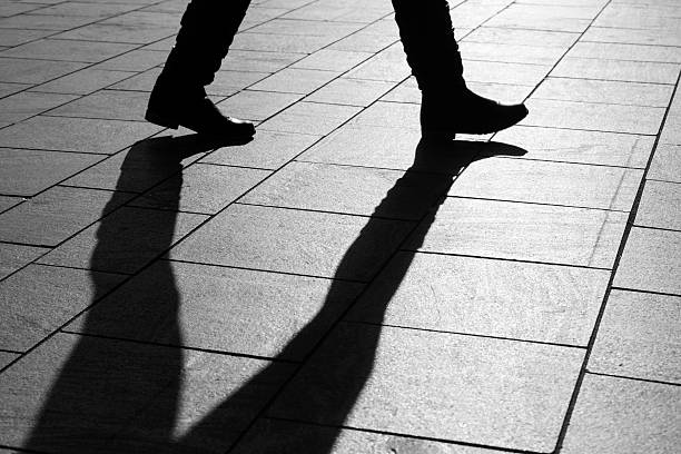 istock sun casting shadow over a businessman on his way 470732562