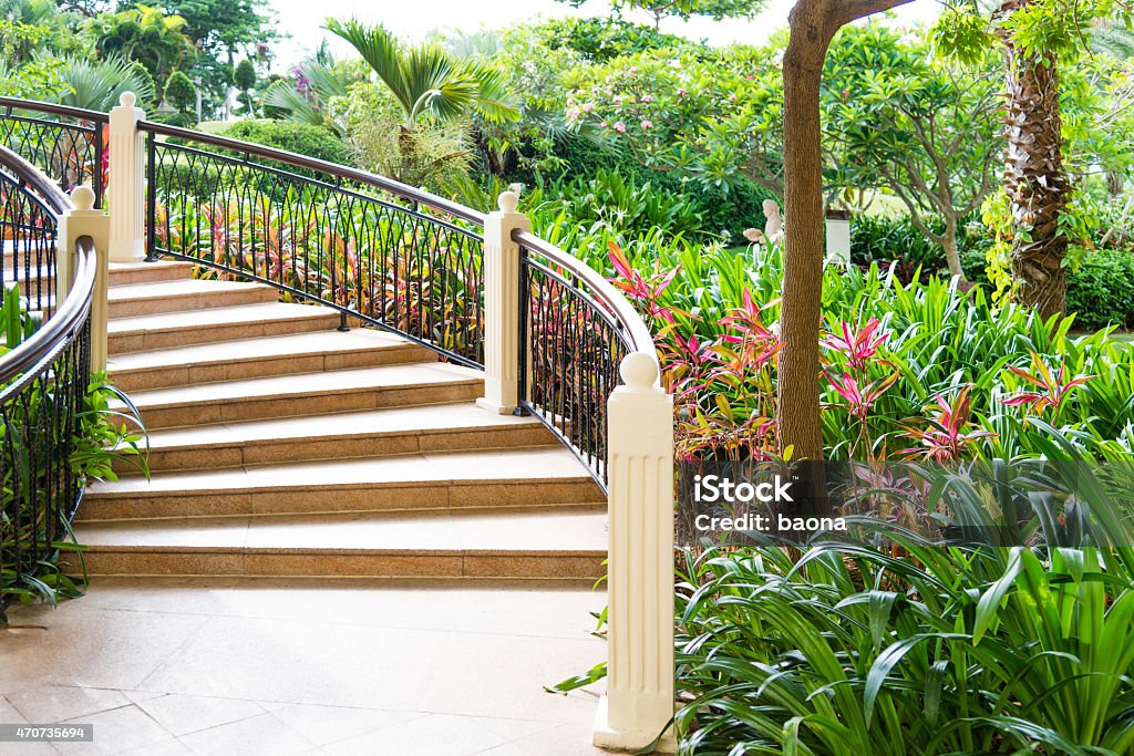 outdoor staircase outdoor staircase surrounded by green plants. 2015 Stock Photo