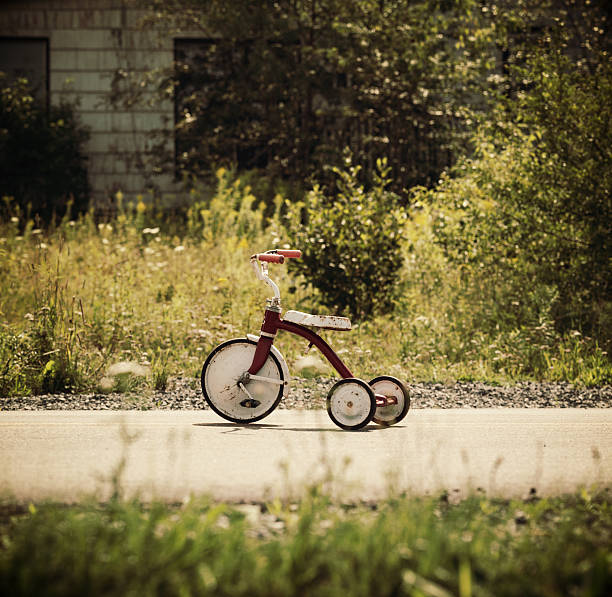 istock Child's Tricycle on Rural Road 470735986