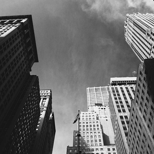 istock High Buildings on Wall Street in Black and White 470740272