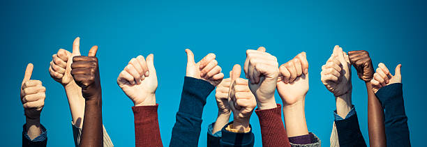 istock Ethnically diverse crowd of thumbs up 470741061
