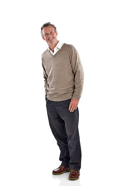 istock Happy looking mature man standing over white 470743018