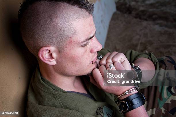 Angry Young Man In Handcuffs After Being Arrested Stock Photo - Download Image Now - Human Trafficking, 2015, Adult