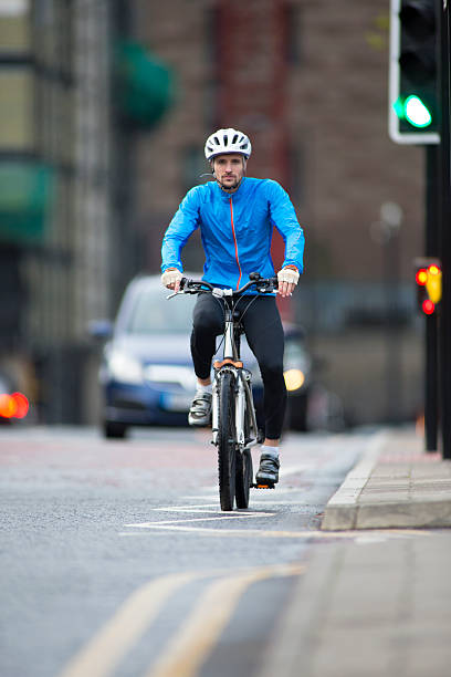 istock Man Riding Bike 470747137