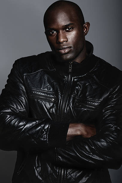 A handsome african man modeling clothes in studio