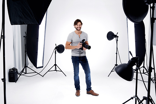 A professional photographer in his studio