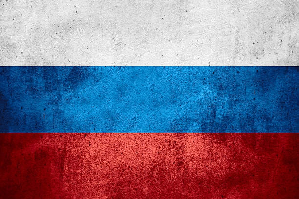 flag of Russia flag of Russia or Russian banner on rough pattern texture background russian flag stock pictures, royalty-free photos & images