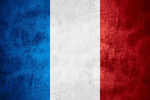 The flag of France in bold colors flag of France or French banner on rough pattern texture background french flag photos stock pictures, royalty-free photos & images