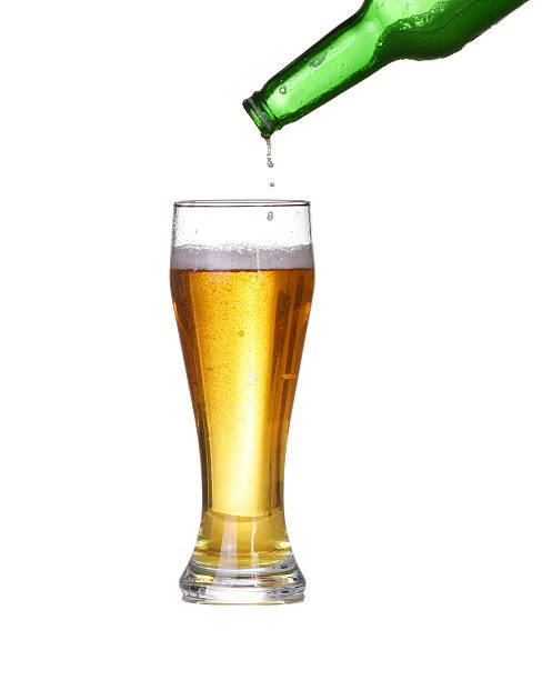 Isolated Beer is poured into a glass Isolated Beer is poured into a glass unbolted stock pictures, royalty-free photos & images