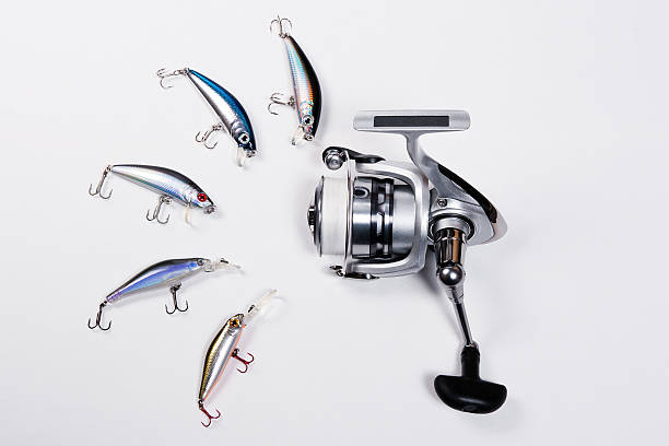 istock Fishing reel with plastic fishing baits. 470749004