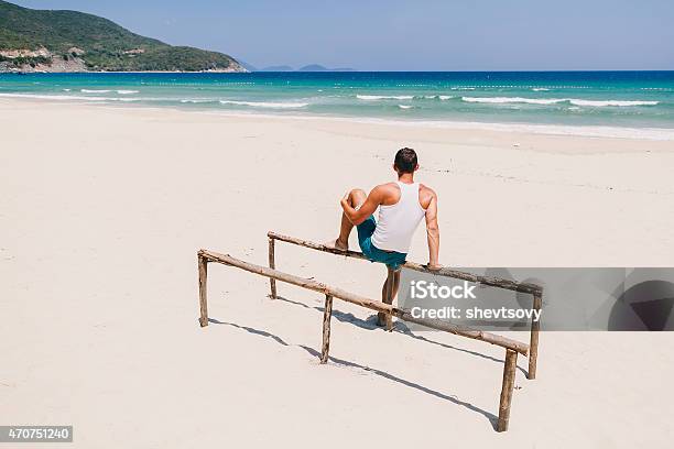 Freedom Man On The Beach Back View Stock Photo - Download Image Now - 2015, Active Lifestyle, Adult