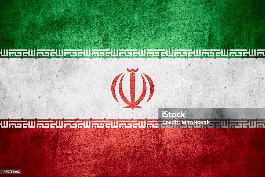 Stylized green, white and red flag of Iran with spatter flag of Iran or Iranian banner on rough pattern texture background Iranian Flag Stock Photo