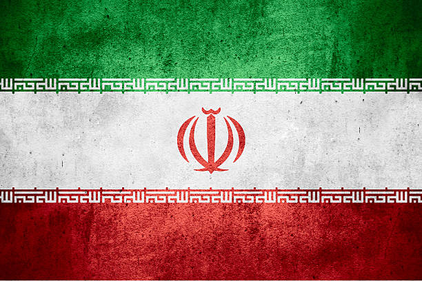 Stylized green, white and red flag of Iran with spatter stock photo