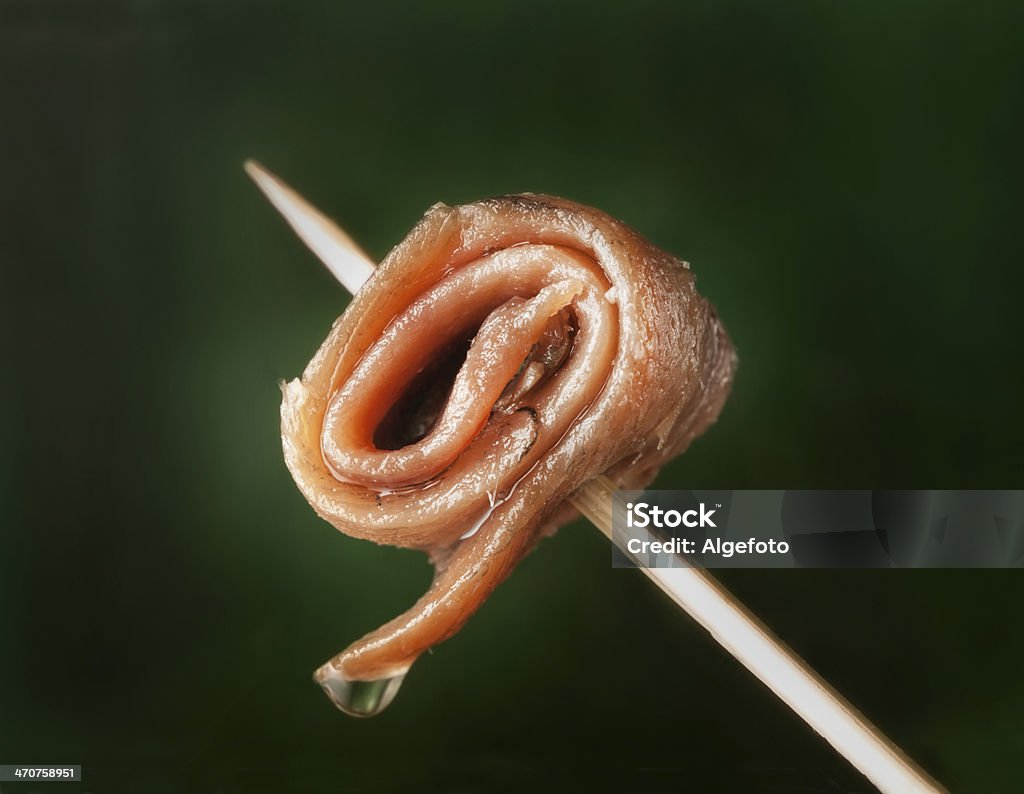 anchovy anchovy on a wooden skewer. Delicious spanish tapa Anchovy Stock Photo