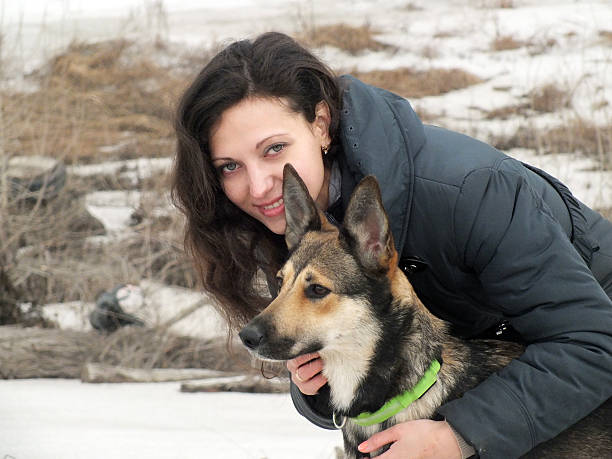 istock Young woman with her dog 470758968