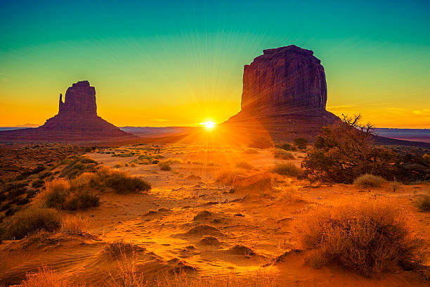 istock Sunset at the sisters in Monument Valley 470759325