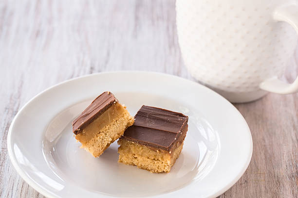 Close Up Chocolate Caramel Millionaire Bars Candy Cookies stock photo