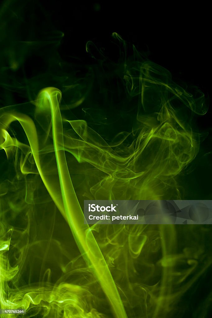 Green smoke on black background. 2015 Stock Photo