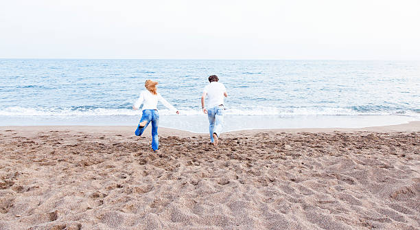 istock Running towards the sea 470765418
