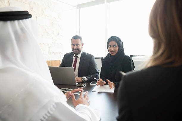 istock Middle Eastern business people in office meeting 470765736