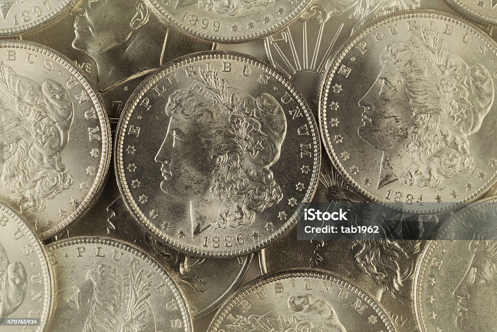 Old Silver coins from United States Vintage concept of old silver coins with filled frame. Currency Stock Photo