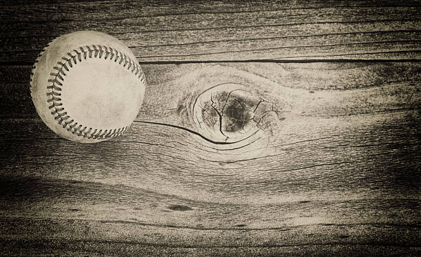 istock Used baseball on weathered wood 470765954