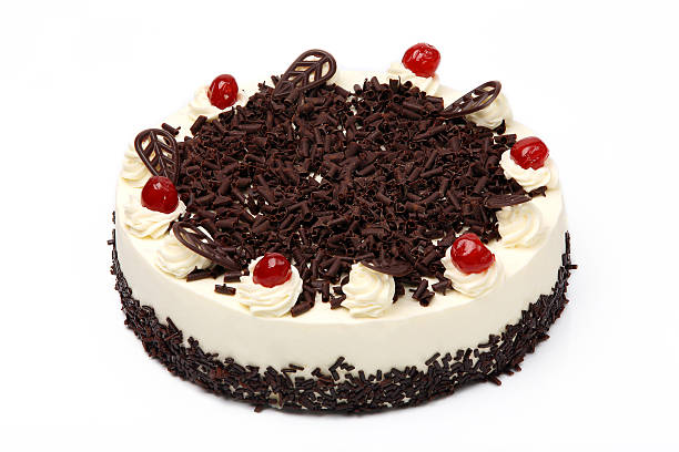 istock Cream vanilla cake with chocolate and cherries on white backgrou 470770302