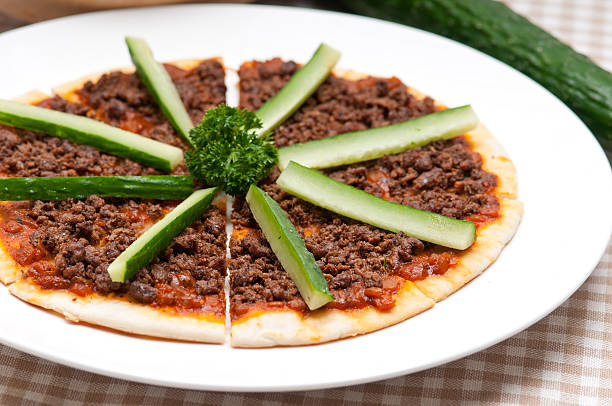 istock Turkish beef pizza with cucumber on top 470773275