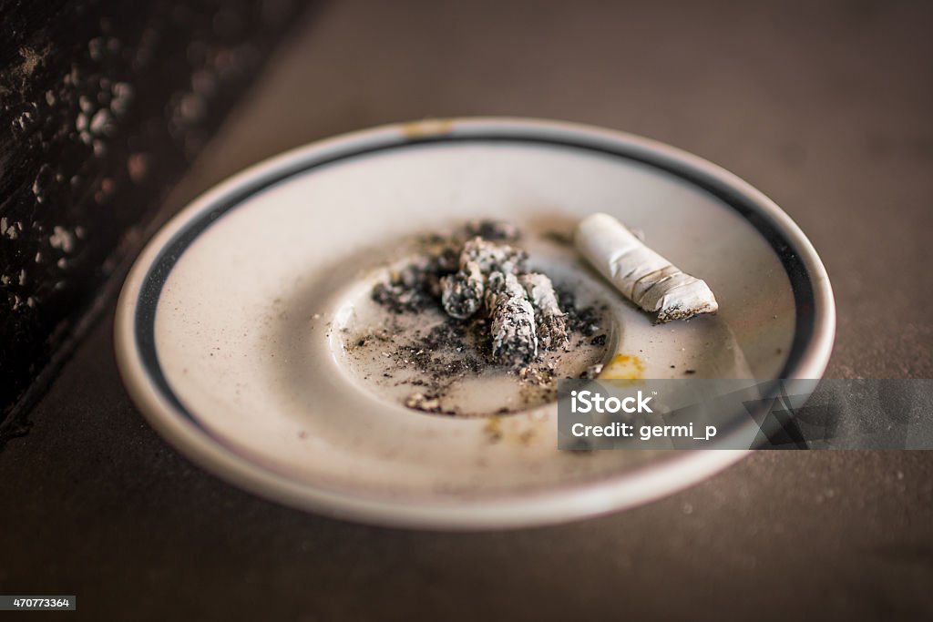 Ashtray A saucer used as ashtrays. 2015 Stock Photo